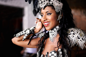 Image showing Dancer, carnival and woman with performance, happy and pride for culture on stage, music and band in night. Girl, smile and people dancing at event, party or celebration for history in Rio de Janeiro