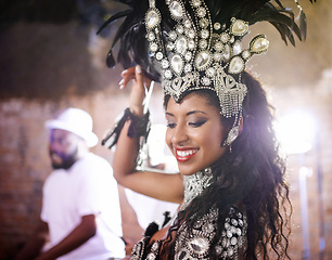 Image showing Dancer, carnival and girl with performance, band or pride for culture in group, music or concert in night. Woman, smile and people dancing at event, party or celebration for show in Rio de Janeiro