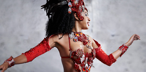 Image showing Culture, dance and woman at carnival in Brazil with costume for celebration, music and happy band performance. Samba, party and girl in street festival, parade or show in Rio de Janeiro with smile.