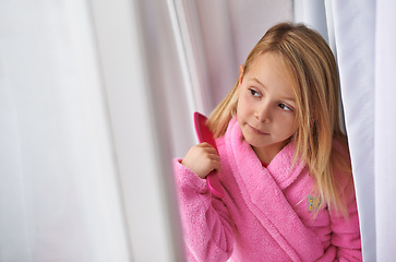 Image showing Child, hair and brush for morning routine in bathrobe for beauty grooming for getting ready, treatment or cosmetic. Girl, kid and comb in home apartment in London for style care, healthy or texture