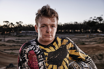 Image showing Sports, dirt and portrait of man biker on offroad in gear for race, challenge or competition. Serious, adventure and face of male athlete motorcyclist with mud at action motorcross rally outdoor.