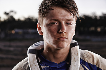 Image showing Sports, dirt bike and portrait of man on offroad in gear for race, challenge or competition. Serious, adventure and face of male athlete motorcyclist with mud at action motorcross rally outdoor.