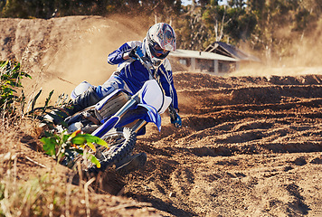 Image showing Person, dirt bike and professional motorcyclist in extreme sports, competition or race on outdoor track. Expert rider on motorbike or scrambler for sand course, challenge or off road rally in nature