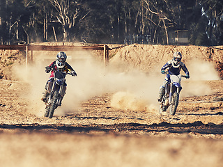 Image showing Sport, racer and motorbike in action for competition on dirt road with performance, challenge and adventure. Motocross, motorcycle and dirtbike driver with helmet on offroad course or path for racing