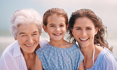 Image showing Portrait, love and family generations on beach in summer together for travel, holiday or vacation. Face of senior mother, woman parent and girl child bonding on sand by sea or ocean for getaway