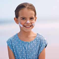 Image showing Little girl, portrait and outdoors with sunscreen, smile and cheerful on holiday vacation. Young daughter, happy and cute confidence for getaway, fun and sunblock for protection and summertime