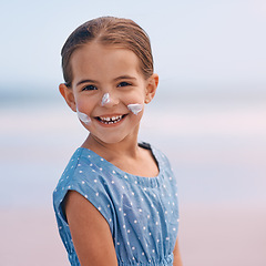 Image showing Young child, portrait and outdoors with sunscreen, smile and cheerful on holiday vacation. Little girl, happy and cute confidence for getaway, fun and skincare for protection and summertime