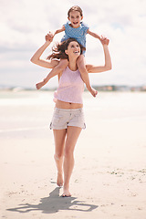 Image showing Happy mom, beach and child on piggyback for fun summer, playful holiday or outdoor weekend in nature. Mother and daughter or kid on shoulders with smile for bonding, love or support by ocean coast