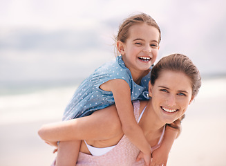 Image showing Mother, daughter and piggyback, portrait on beach for bonding and love, travel and vacation in Mexico. Happiness, care and trust, woman and girl kid playing game with smile and family time outdoor