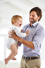 Image showing Dad, baby and laughing while playing, bonding and love at home for child development and growth. Father, parent and infant for fun, cheerful and family at house after work and getting kid to sleep