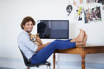 Image showing Happy man, computer screen or portrait with dog for work or technology mock up for online publisher in agency. Young guy, face or desktop for company with pet or feet on table to relax with chihuahua