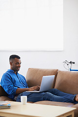 Image showing Man, laptop and freelancer for remote work at home, plan and copywriting in living room. Black male person, mockup space and connection for research on website, information and typing an article