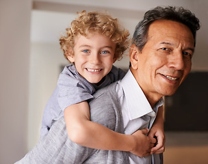 Image showing Portrait, senior man and boy with smile for multiracial family, bonding and together at home. Happy, grandfather and male child with hug, care and love for fun, cheerful and babysitting in retirement