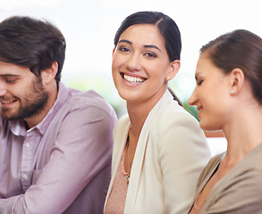 Image showing Portrait, smile and woman with creative team in office for design, meeting or planning together. Face, business and collaboration with happy young designer group in workplace boardroom for teamwork