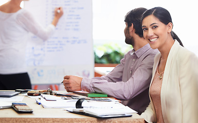 Image showing Portrait, smile and presentation with business woman in boardroom of office for meeting or training. Education, learning and upskill development with happy young employee in company workplace