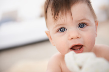 Image showing Happy, baby and portrait for growth and development with face of infant with innocence. Toddler, adorable and cute, smiling and teething for childhood and young at home or in nursery for play