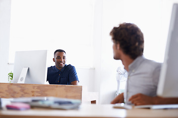 Image showing Businessmen, talking and computers in office for planning, collaboration and brainstorming at desk. Diverse people and web designers with tech for conversation, projects, ideas or online research