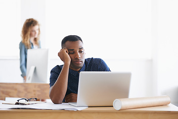 Image showing African, businessman and laptop with office, tired and stress with work. Employee, technology and paperwork with computer, fatigue and startup or small business with plans for entrepreneurship