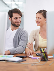 Image showing Coworking, smile and business people with computer consultant employees with website. Happy, flirting and tech in an office with digital collaboration and teamwork together at a startup company