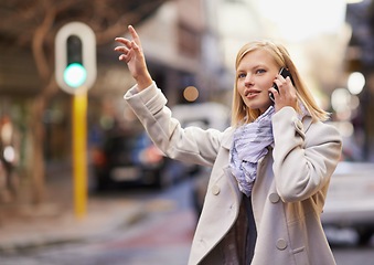 Image showing Phone call, taxi and woman in city, traveling and public transport to office. Business female person, waiting and waving down cab in New York, urban commute and smartphone for communication