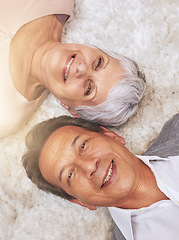 Image showing Portrait, senior or happy couple on carpet to relax in home for bonding or support together. Above, old people or man lying down on floor by an elderly woman for love, retirement or care in marriage