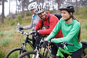 Image showing Friends, cyclist and fitness on bike with for adventure, exercise and health with bonding in Chicago. Happy, trail and mountain with hobby for mindset in nature, trip and wellness for fun.