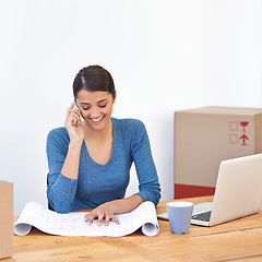 Image showing Happy, woman and phone call with blueprint and laptop of small business and renovation plan with smile. Employee, conversation and paperwork of office development with mobile and moving at morning