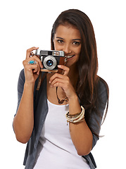 Image showing Portrait, camera and happy woman in studio for creative photoshoot, memory or capture on white background. Lens, career and face of student journalist with equipment for paparazzi, news or reporting