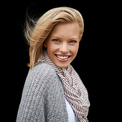 Image showing Autumn, fashion and portrait of happy woman in studio, black background or mock up space. Casual, style and girl with beauty from makeup, cosmetics or positive attitude in cardigan, jersey and scarf