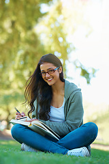 Image showing Writing, books and portrait of woman in park for studying, learning and reading on campus outdoors. Education, knowledge and happy person with notes, textbooks and ideas for university or college