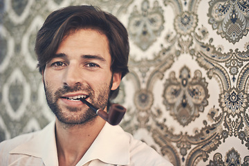 Image showing Man, portrait and pipe for vintage style with antique wallpaper for retro, old school feel with gen x. Male person, smoking and decor for cool trendy look with shirt, beard and closeup with pattern