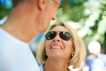 Image showing Senior couple, romantic and care in outdoor in nature, happy and bonding together in forest on holiday. Mature man, woman or respect on summer adventure for celebration or love on honeymoon in europe