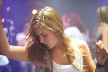 Image showing Dance, night and music with woman at club for performance, dj event and energy. Rock, musician festival and celebration with female person in crowd at nightclub party for concert and disco show