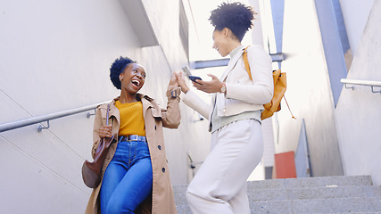 Image showing Happy, high five and friends with phone outdoor on stairs in city with celebration of success or achievement. Excited, women and support for announcement of college news, information or notification