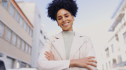 Image showing Woman, portrait and arms crossed in street for mission, motivation or mindset with confidence in city. Entrepreneur, employee and female person with smile for business, success or satisfaction