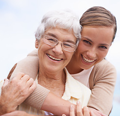 Image showing Hug, happy and portrait of senior mother with daughter embrace for bonding, relationship and love. Family, retirement and face of elderly parent with woman for care, affection and relaxing outdoors