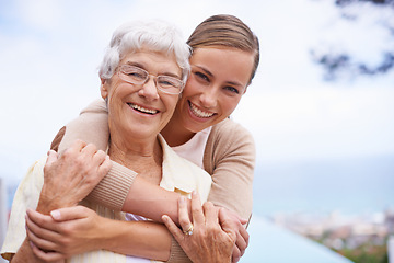 Image showing Hug, love and portrait of senior mother with daughter embrace for bonding, relationship and love. Family, retirement and happy elderly parent with woman for care, affection and relaxing outdoors