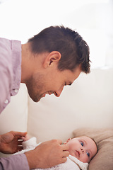 Image showing Family, baby and dad on sofa with love, support and care together with parent and bonding. Relax, father and happy in a house with development of a calm infant with childcare and smile and growth