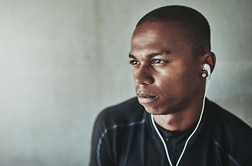Image showing Man, thinking and music for fitness outdoor with face, listening to podcast or exercise for healthy body. Athlete, african person and earphones with audio, radio and sound for workout on mockup space