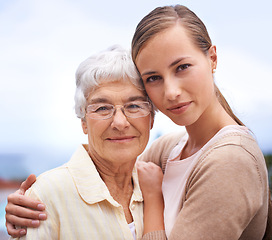 Image showing Hug, nature and portrait of senior mother with daughter embrace for bonding, relationship and love. Family, retirement and elderly parent with affection for woman on holiday, vacation and weekend