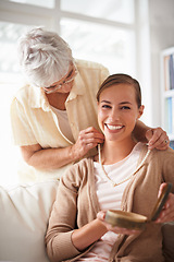 Image showing Home, necklace and portrait of senior mother and woman for present, gift and surprise in living room. Family, happy and daughter with mom giving pearls on sofa for celebration, birthday and bonding