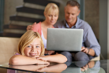 Image showing Portrait, happy child and parents in lounge with love, relax and laptop for movie on weekend in house. Father, mother or daughter face with smile for care in home or stream for online subscription