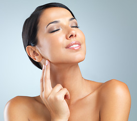 Image showing Skincare, shine and woman with cosmetics, wellness and makeup on grey studio background. Person, model and girl with dermatology or glowing with beauty and facial with aesthetic, confidence or health