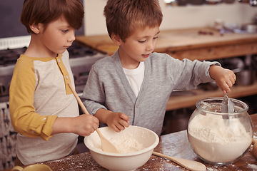 Image showing Boys, baking and creative in kitchen with flour and measurement of dry ingredients in bowl for cake. Children, bonding and messy for cookies in home, love and pastry recipe for holiday learning