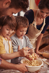 Image showing Happy family, learning and baking in kitchen with cookie dough, home and support for cake with love. Parents, teaching and kids for biscuits on table, care and bonding together on vacation in house