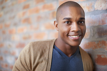 Image showing Man, portrait and student for casual fashion by wall background, smile and confidence for style. Black male person, happy and satisfaction for cool clothes, gen z and pride for aesthetic in outdoors