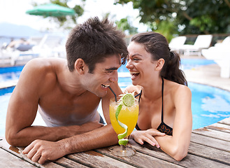 Image showing Swimming pool, cocktail and couple with vacation, funny and weekend break with happiness and laughing. Sunshine, man and woman with tropical drink and love on holiday and luxury with water or summer