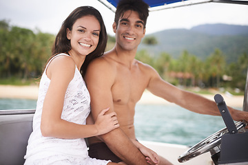 Image showing Couple, portrait and driving boat on ocean holiday or explore sea on vacation adventure, travel or steering wheel. Man, woman and happy in Hawaii or outdoor journey or coast, transportation or nature