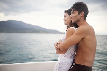 Image showing Couple, boat and embrace on ocean on vacation, love and relax by water on summer holiday. People, cruise and bonding for relationship in outdoors, support and hug on weekend trip to sea on yacht