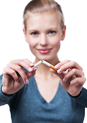 Image showing Studio, portrait and happy woman with broken cigarette to quit tobacco for health, wellness and results. White background, girl and stop smoking for healthcare benefits, commitment and support.